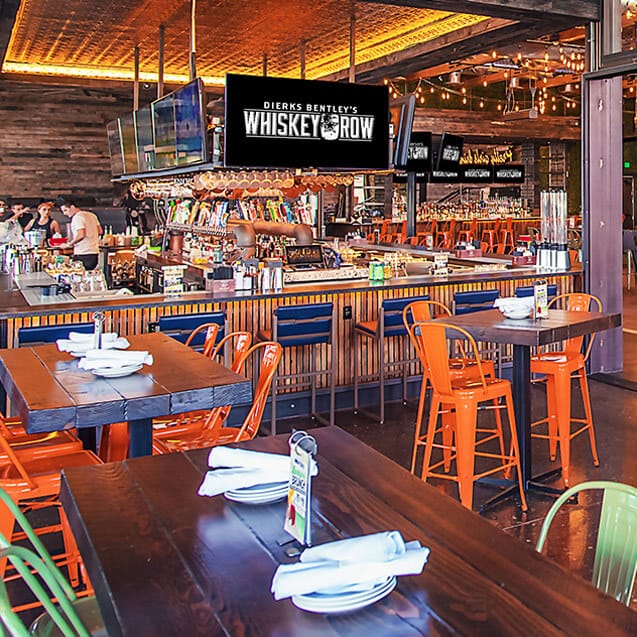 Private dining room at Dierks Bentley's Whiskey Row, vibrant setting for events and meetings.