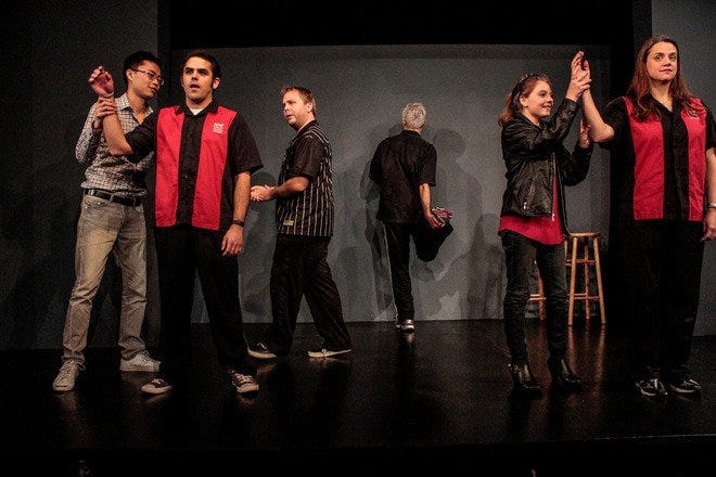 Dynamic performance at National Comedy Theatre, ideal for corporate events and team-building.