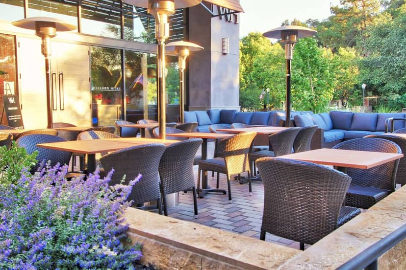 Private room at Willard Hicks Grill with outdoor seating for casual meetings and events.