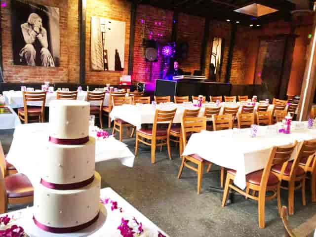 Elegant Upstairs Dining Room with three-tiered cake, perfect for weddings and celebrations.