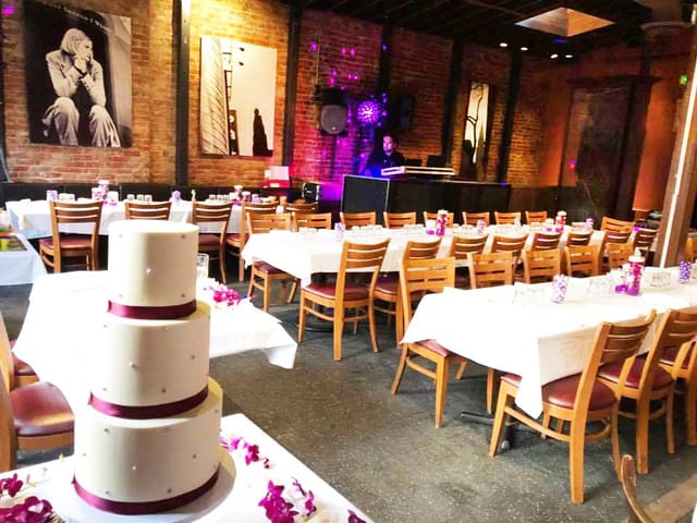 Elegant Upstairs Dining Room with three-tiered cake, perfect for weddings and celebrations.