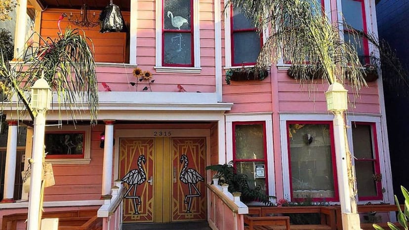Vibrant restaurant entrance with colorful walls, perfect for events and gatherings.
