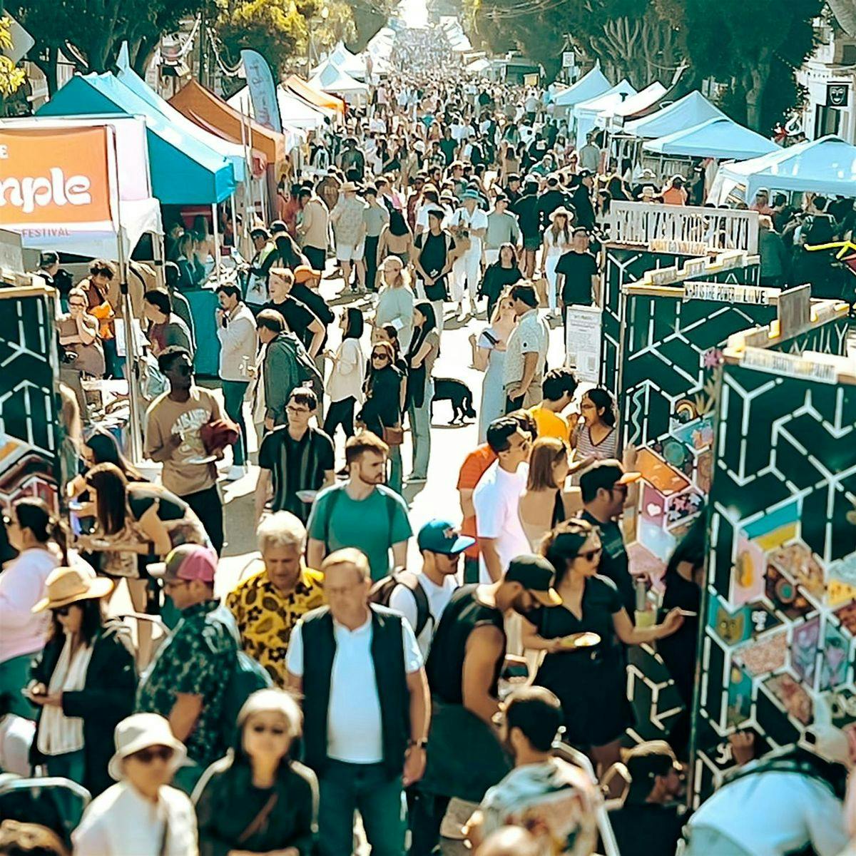 Union Street Festival with diverse attendees enjoying food and drinks outdoors.