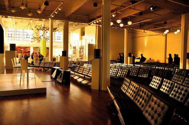 Spacious TERRA Gallery venue with modern seating for presentations and networking events.