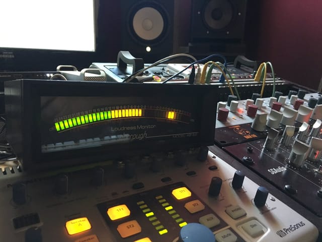 Close-up of audio equipment in Tone Freq Mastering Studios for events and presentations.