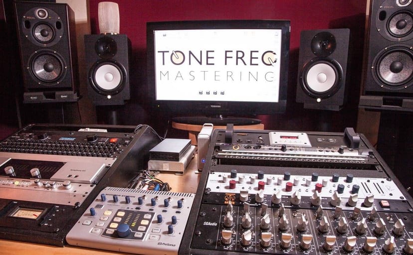 Professional audio mastering studio with high-quality sound equipment for events.