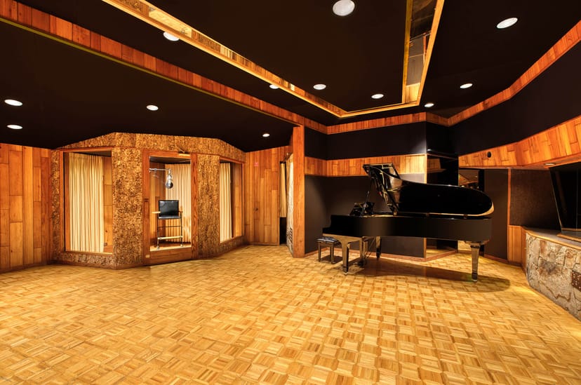 Sophisticated event space with grand piano, ideal for music events and workshops.
