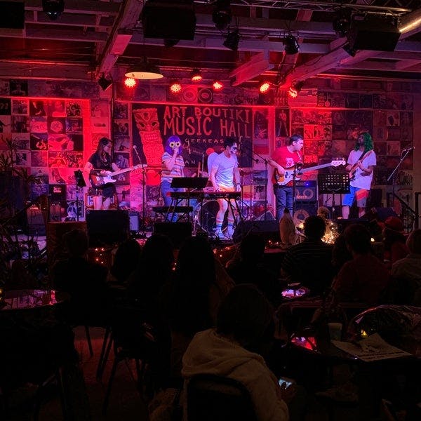 Vibrant live music performance at The Art Boutiki Music Hall, ideal for events and parties.