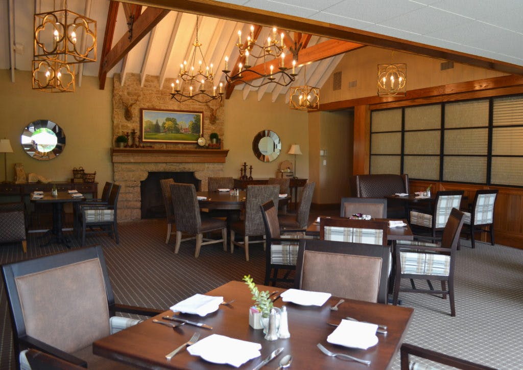 Elegant dining space in Brookside Clubhouse, perfect for networking dinners and intimate events.