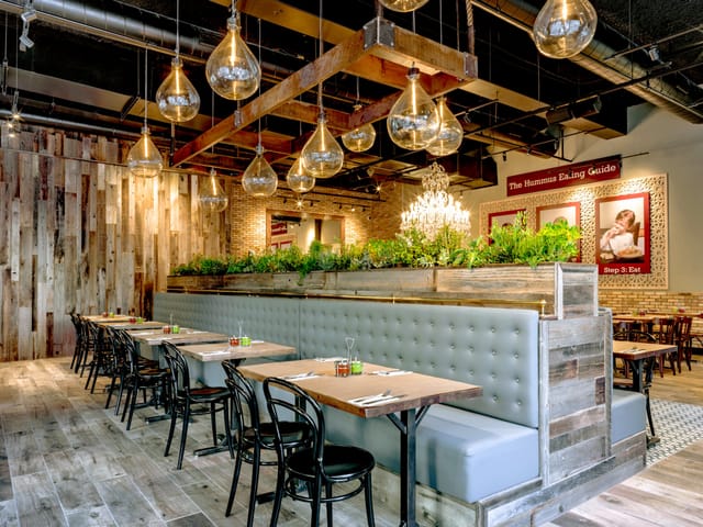 Stylish Oren's Hummus restaurant interior for intimate meetings and small events.
