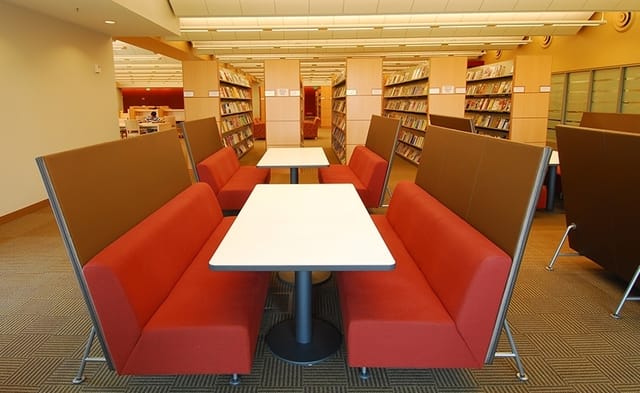 Modern booth seating in ARS Viewing Room, Santa Clara University Library for collaborative meetings.
