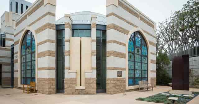 Modern Temple Beth Israel venue with stone and glass, perfect for events and receptions.
