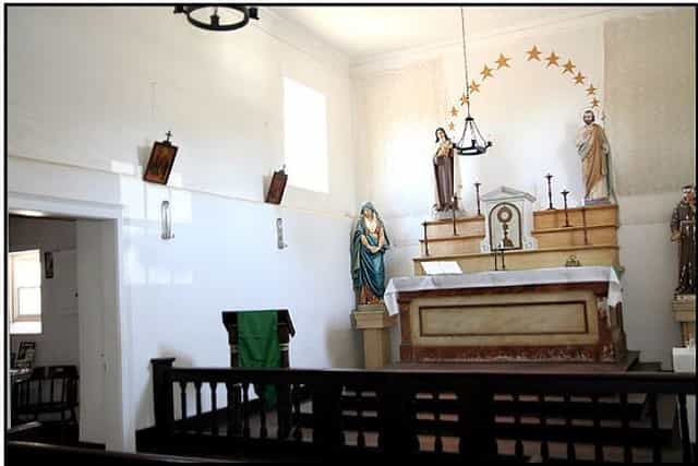 Adobe Chapel interior with elegant decor, perfect for intimate spiritual retreats and gatherings.