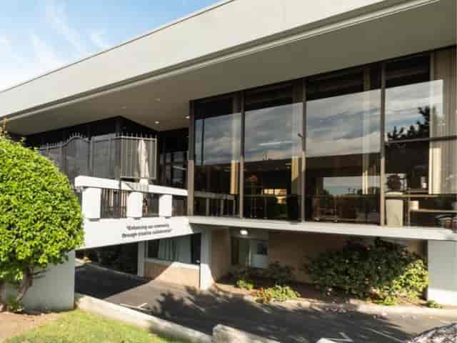 Modern Lisbon Vista Community Center with large windows, perfect for events and meetings.