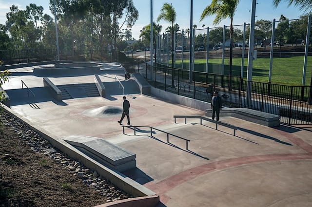 Modern skate park with ramps in Park de la Cruz for youth events and competitions.