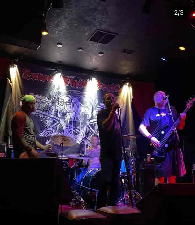 Live band performing at The Kensington Club's vibrant cocktail lounge event.