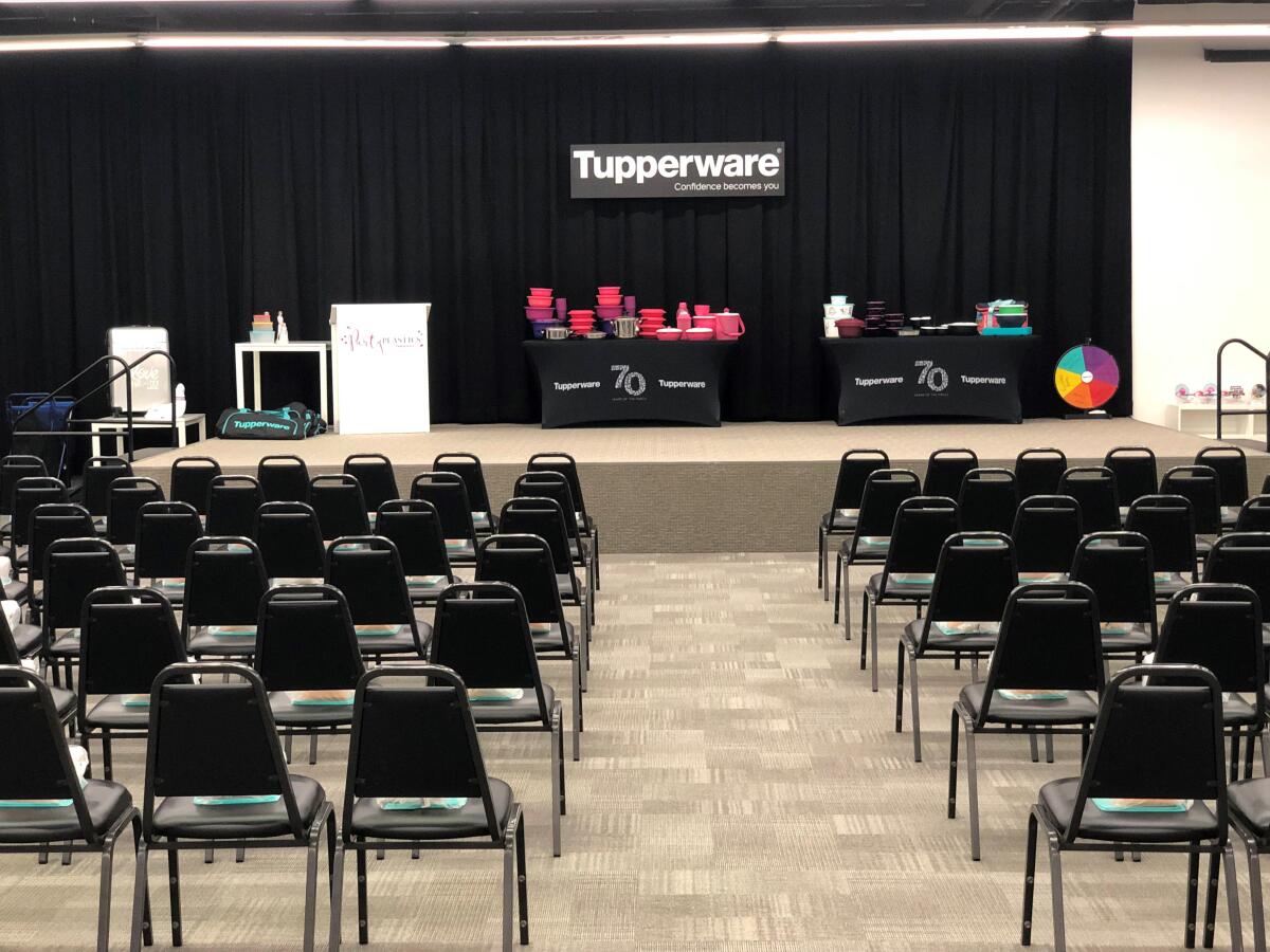 Meeting space at Community Actors Theatre set for a Tupperware event with organized seating.