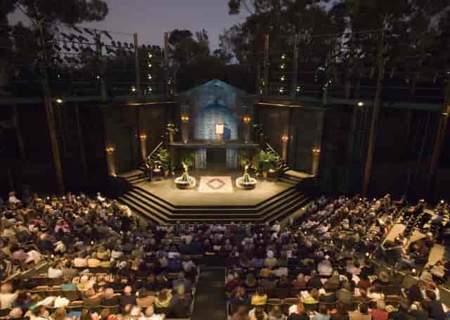 Outdoor amphitheater with engaged audience, ideal for performances and events.