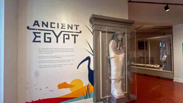 Ancient Egypt exhibit with mummy display at Museum of Us, ideal for cultural events.