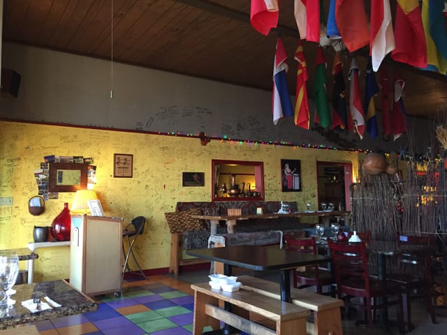 Vibrant Pomegranate restaurant with eclectic decor for creative events and gatherings.
