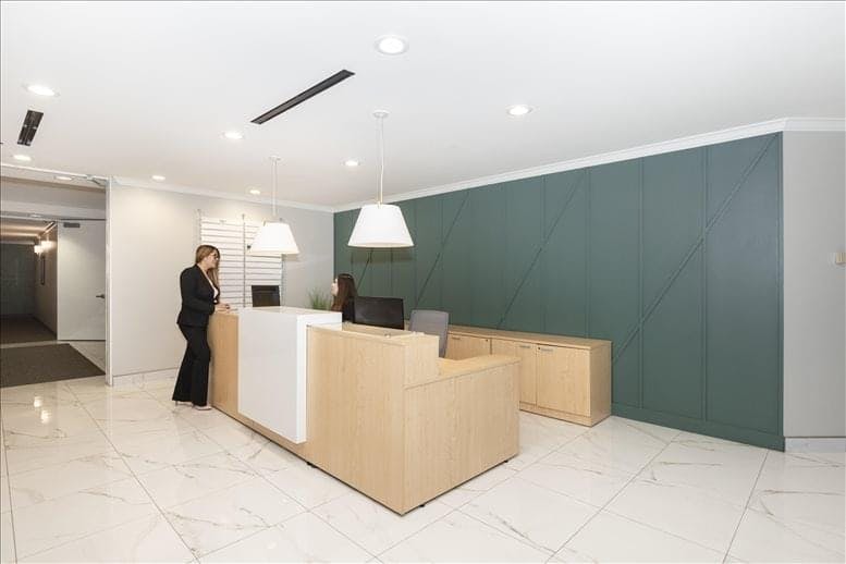 Modern reception area in 3111 Camino Del Rio North for corporate meetings and events.