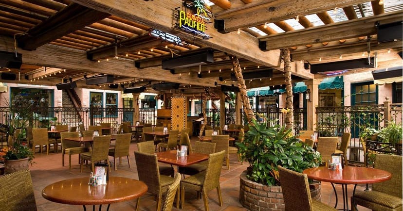 Spanish Courtyard at El Cordova Hotel, rustic outdoor dining for events and gatherings.