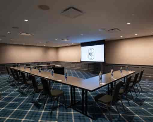 Meeting room with U-shaped table for corporate events at Buca di Beppo Campbell.