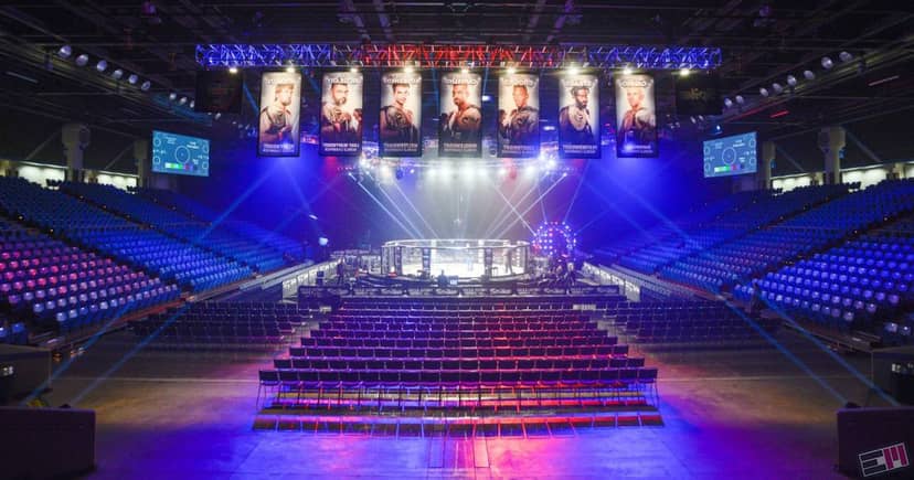Provident Credit Union Event Center with octagonal cage for combat sports competition.