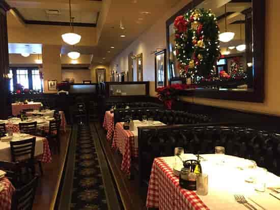Maggiano's San Jose restaurant with checkered tablecloths, perfect for festive gatherings.