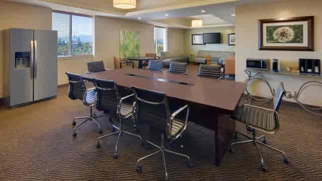 Modern conference room with ergonomic chairs for productive meetings in Silicon Valley.