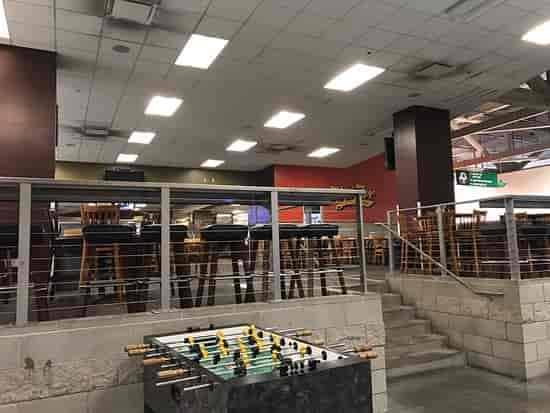 Spacious Silver Creek Sportsplex restaurant with foosball table for networking events.