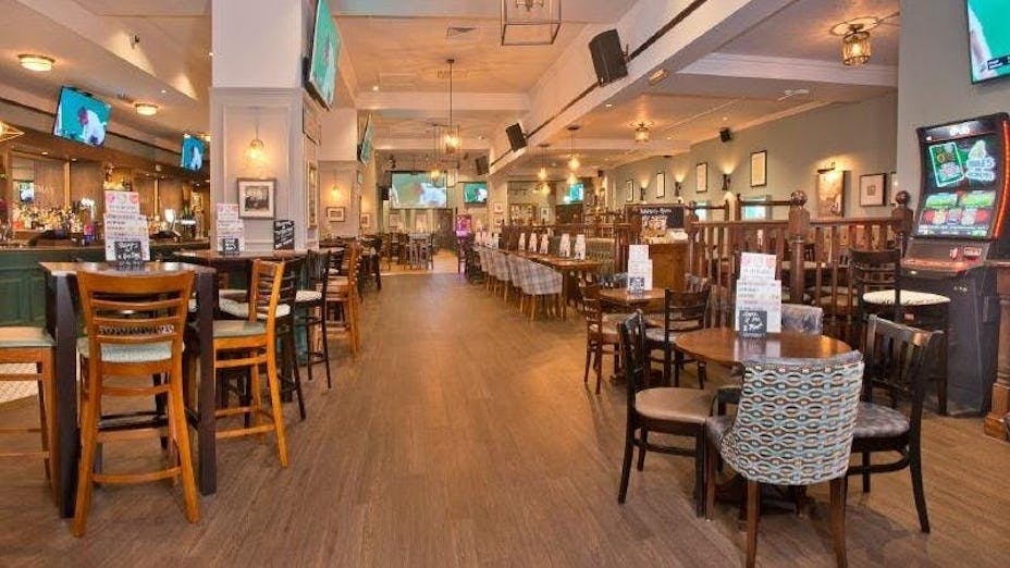 Spacious Sportsman Pub restaurant with modern decor, ideal for events and gatherings.