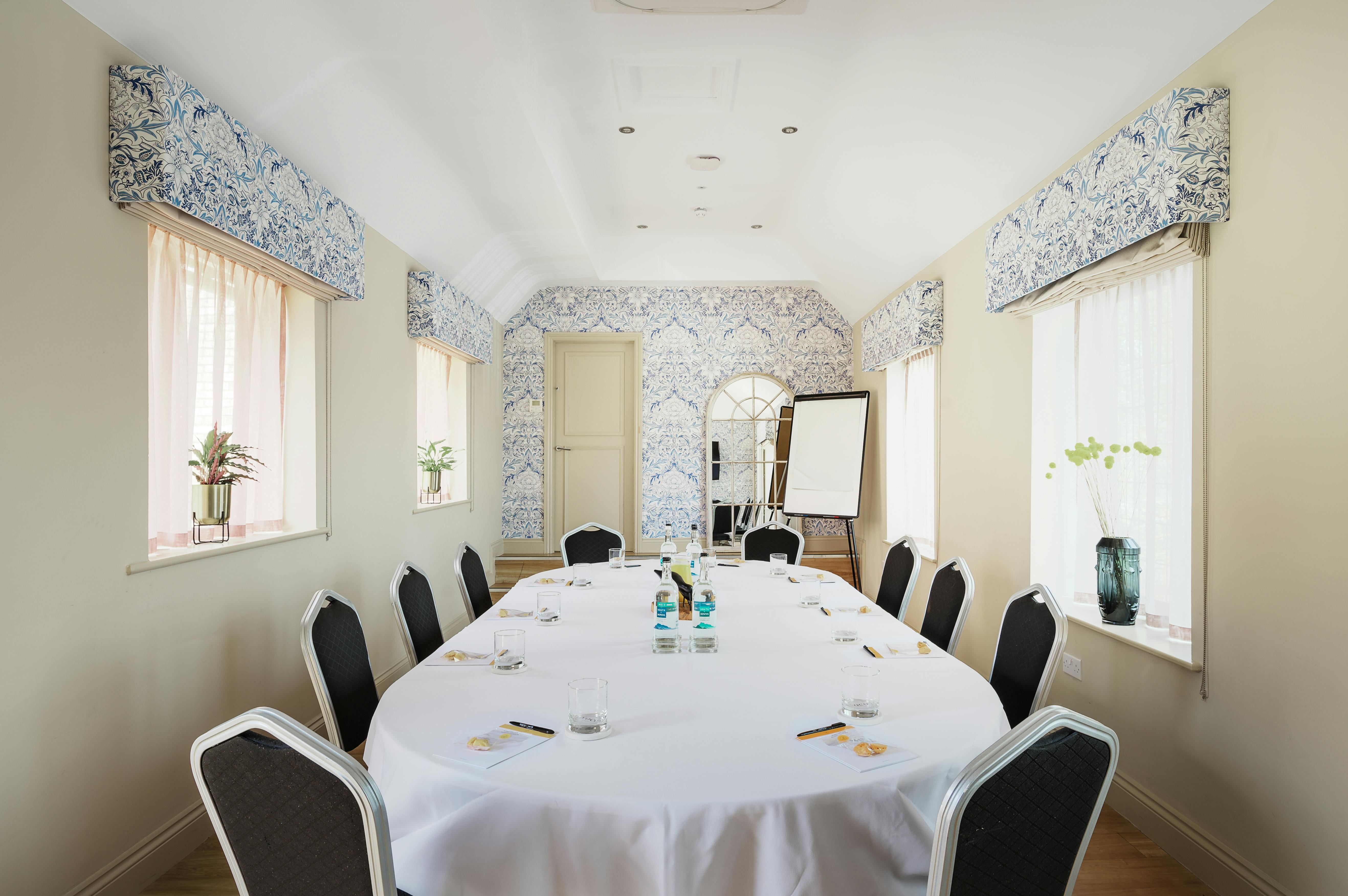 Willow Suite meeting room at Voco Lythe Hill, perfect for workshops and strategy sessions.