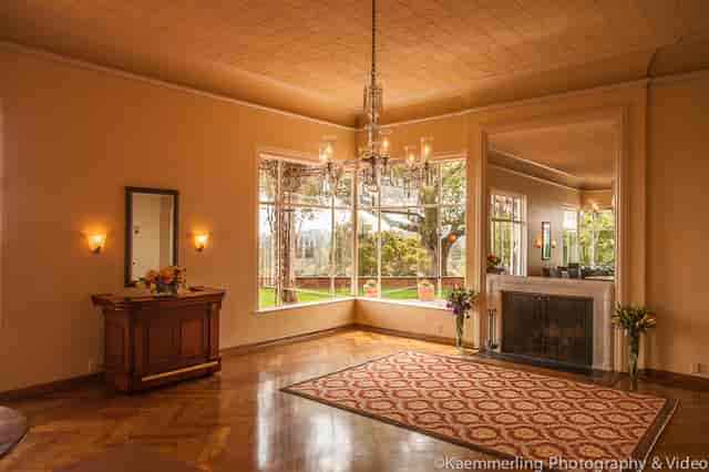 Elegant Main Dining Room with large windows, perfect for events and gatherings.