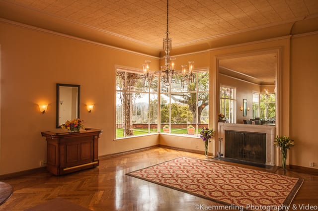 Elegant Main Dining Room with large windows, perfect for events and gatherings.