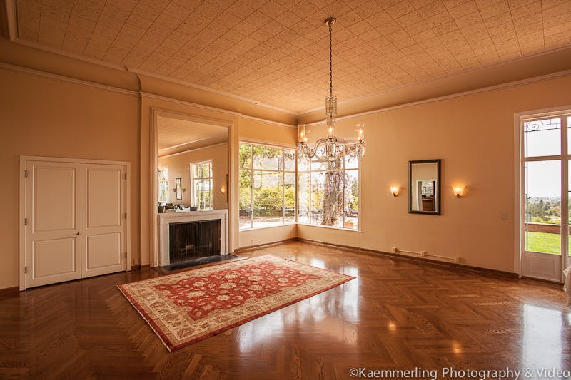 Elegant Main Dining Room with chandelier, perfect for events and gatherings.