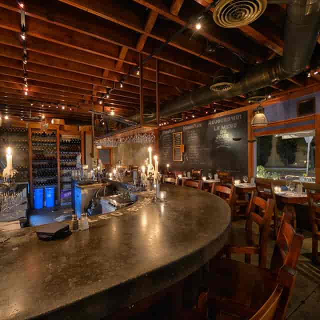 Cozy Stone Room at Bleu Bohème, perfect for intimate private events and gatherings.