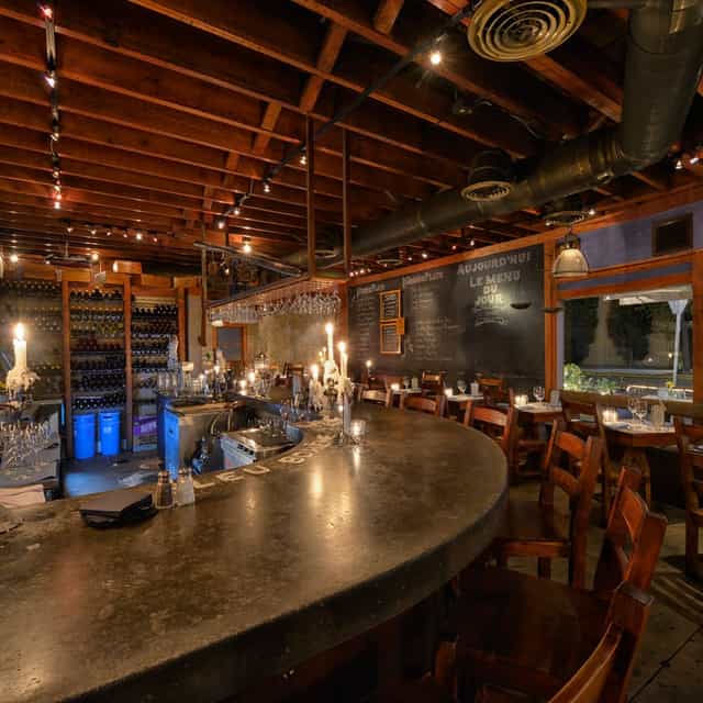 Cozy Stone Room at Bleu Bohème, perfect for intimate private events and gatherings.