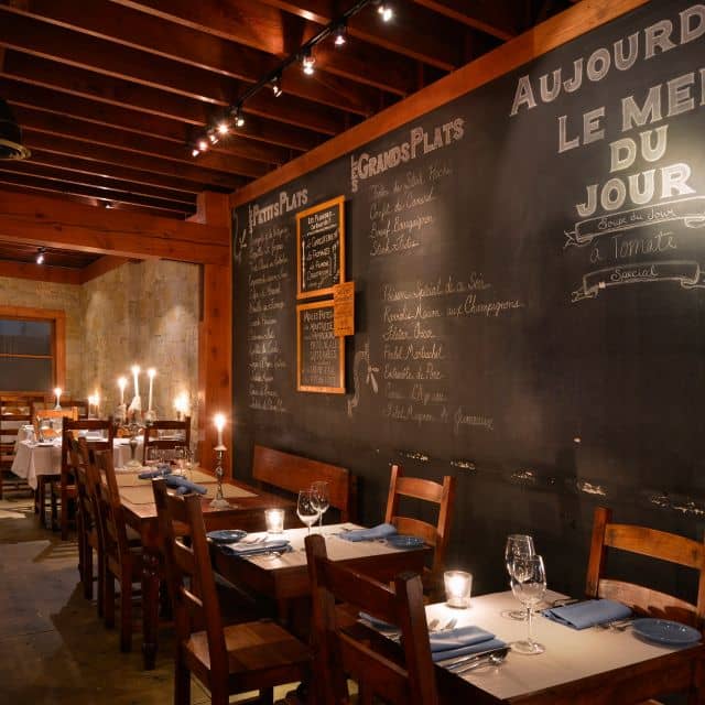 Charming dining space in The Stone Room, perfect for intimate gatherings and events.