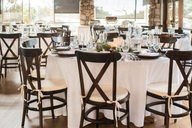 Historic Scripps Dining Room, elegant wedding venue with white linens and natural light.