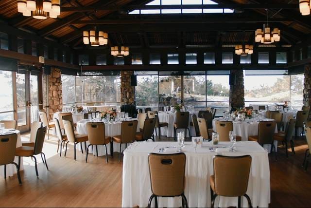 Elegant event space with round tables at Surf & Sand Dining Room, Asilomar Hotel.