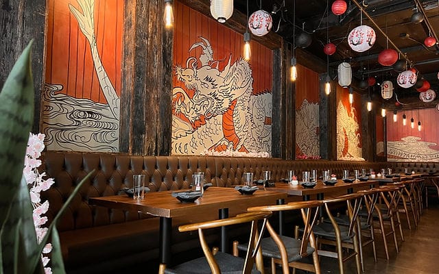 Dragon Horse Bar & Restaurant dining space with dragon murals, perfect for networking events.