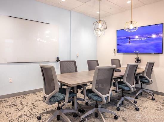 Modern conference room with ergonomic chairs for productive meetings in Cupertino.