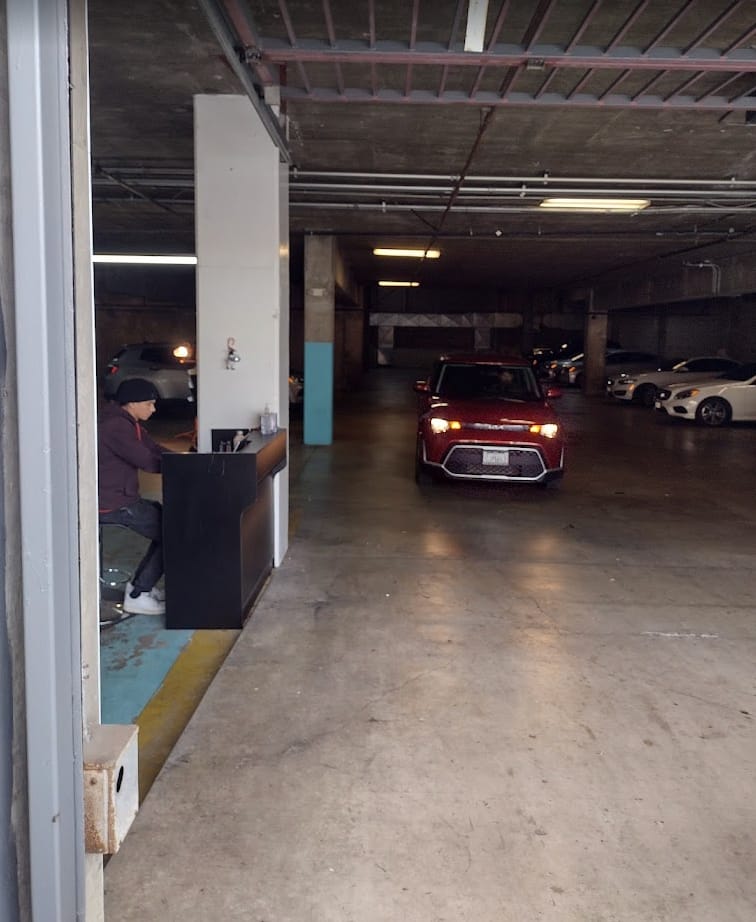 U-Save Car & Truck Rental office with parking garage, showcasing event logistics challenges