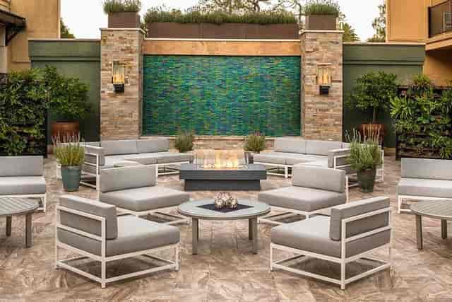 Stylish outdoor lounge at Toll House Hotel for networking events and receptions.
