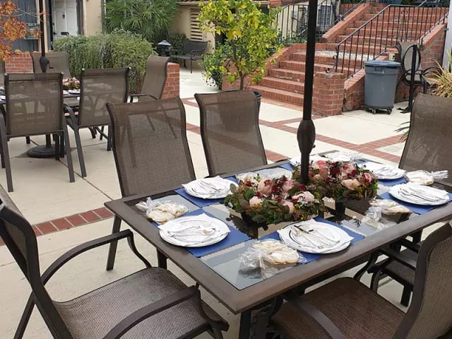 Central Courtyard at Los Gatos Garden Inn, elegant outdoor dining setup for events.