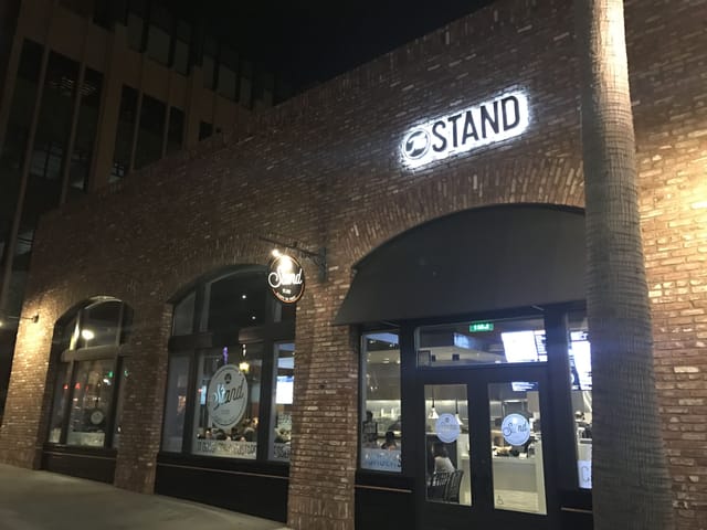 Stylish bar area with modern brick facade, perfect for events in Calabasas.
