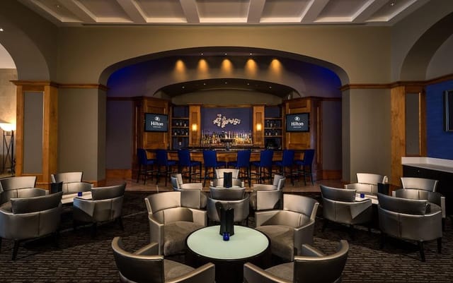 VIP Lounge at The 49er Inn: modern event space with stylish bar for networking and receptions.