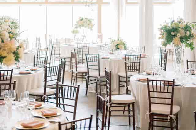 Elegant event space at Dynasty Restaurant with floral centerpieces for weddings and corporate events.