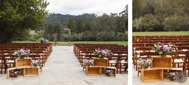 Outdoor wedding ceremony at Brazilian Room with floral arrangements and wooden chairs.